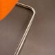 Chrome-plated steel and orange fabric armchair, Germany, 1980