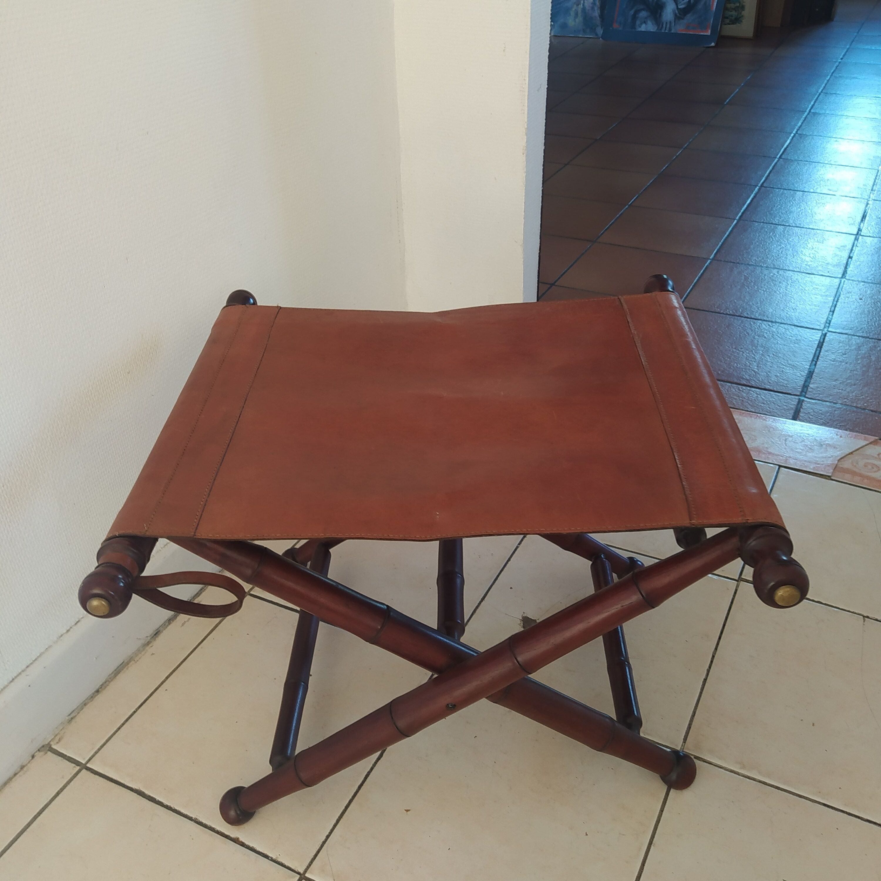 Vintage foldable leather and mahogany stool
