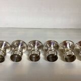 Six silver-plated metal candlesticks with punches