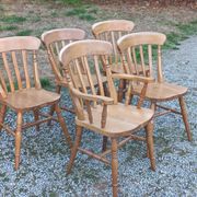 Set of 4 chairs and 1 armchair in mountain style made of oak.