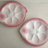 Vintage oyster plates in the shape of a sole.