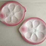 Vintage oyster plates in the shape of a sole.