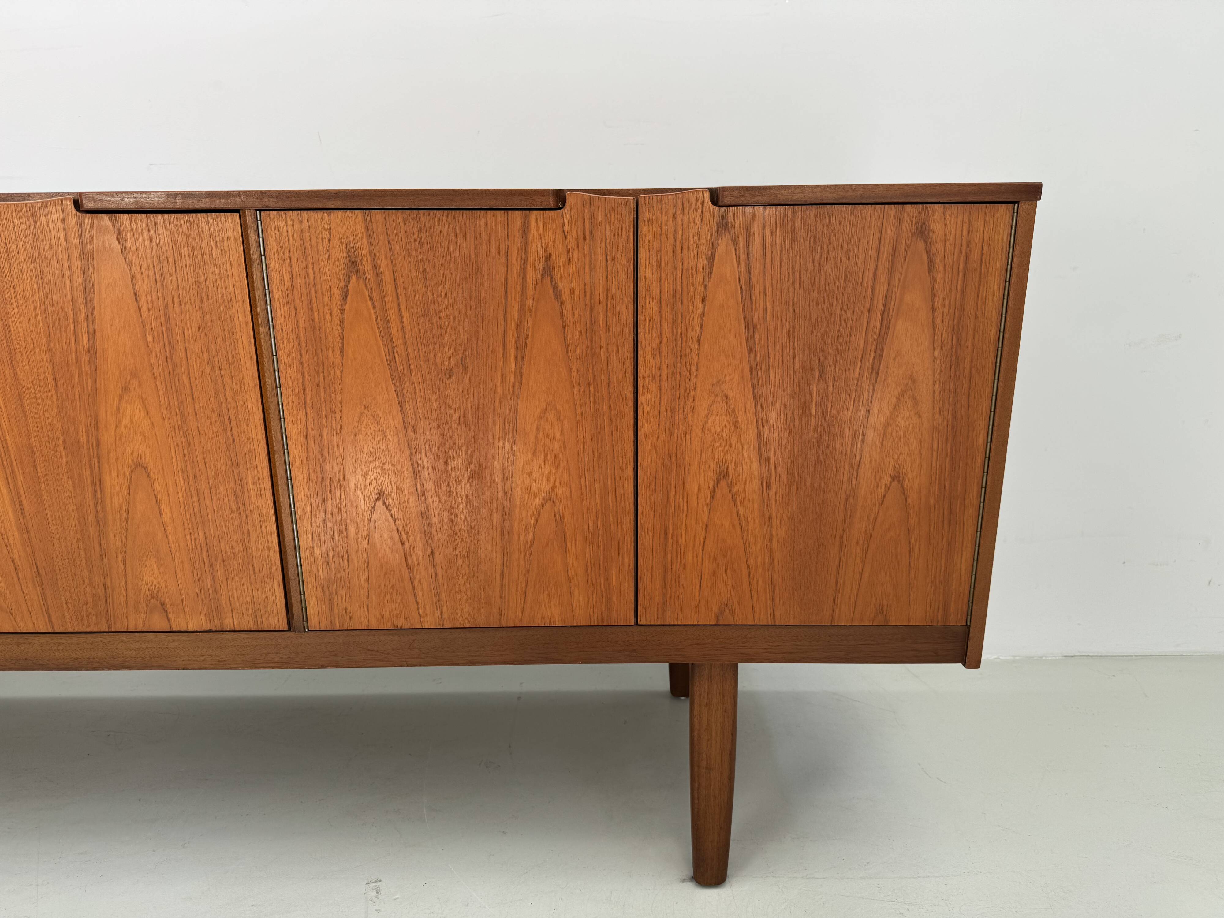 Unique vintage teak sideboard from the 1960s, produced by Nathan in the UK.