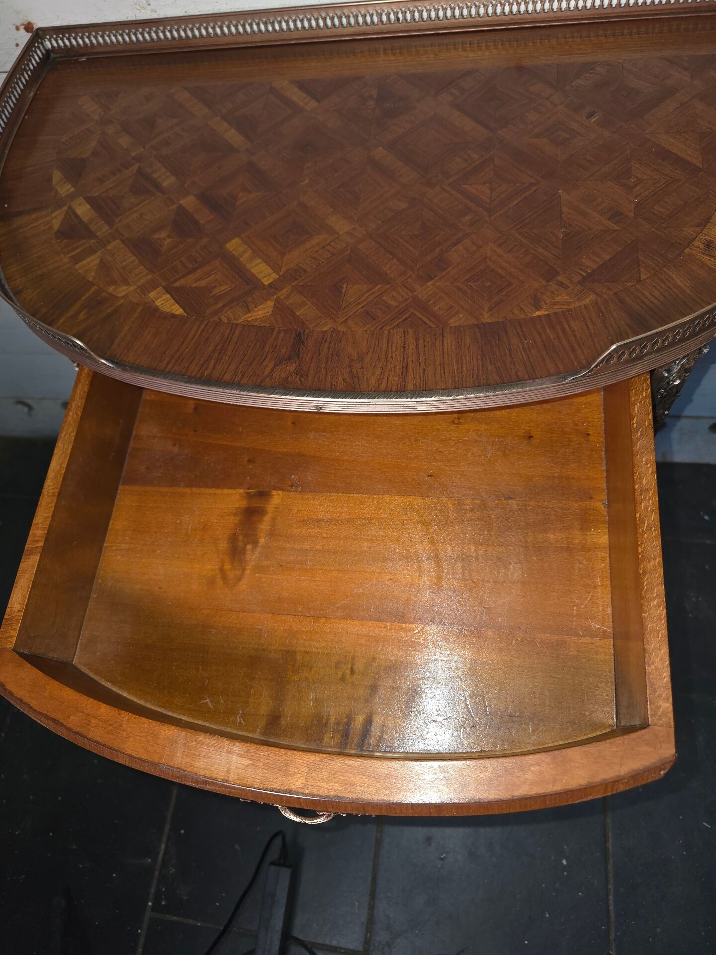 Small curved chest of drawers in Louis XV style with marquetry.
