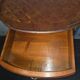Small curved chest of drawers in Louis XV style with marquetry.
