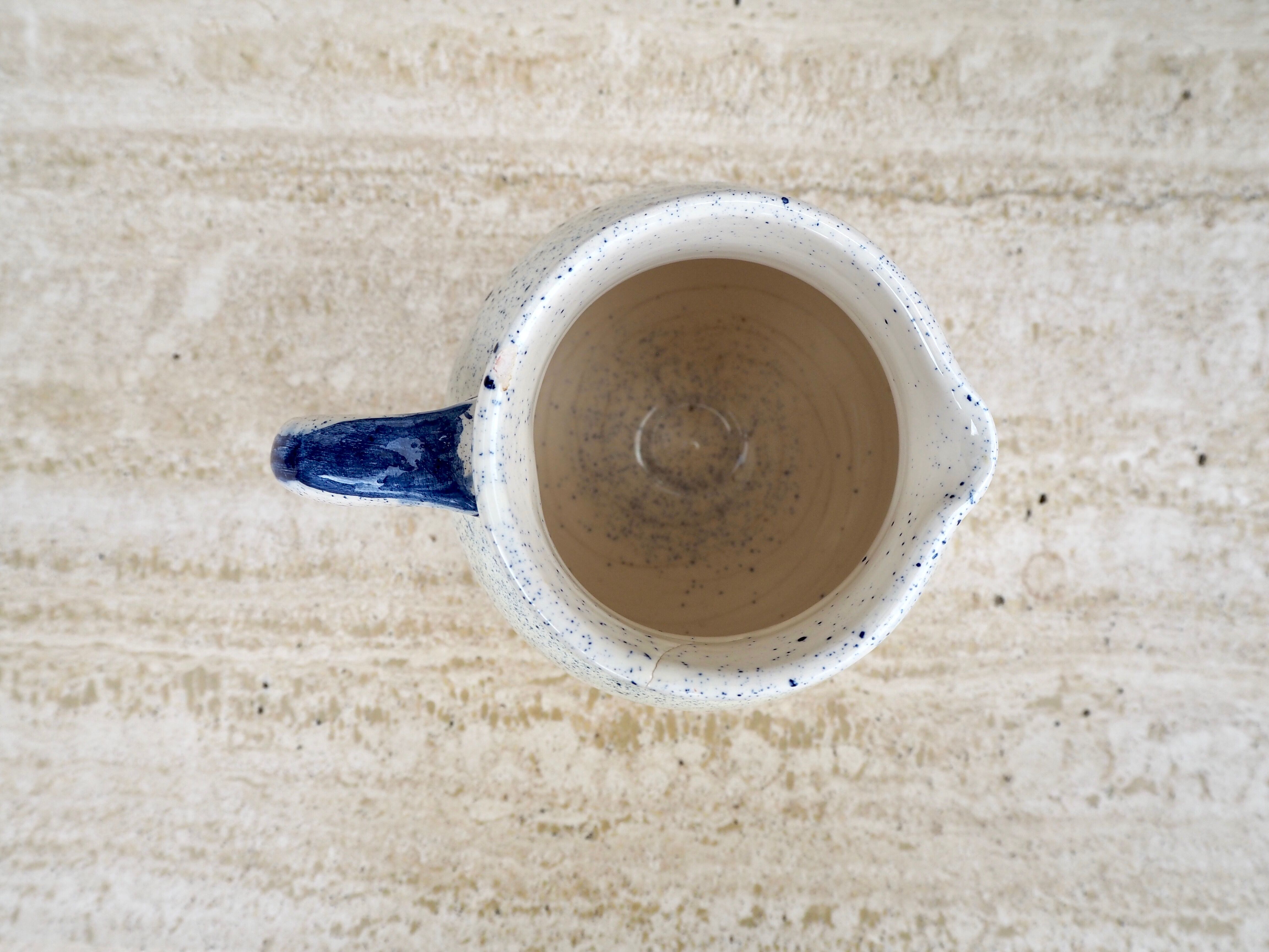 Speckled ceramic pitcher