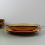 Set of 8 ocher enameled ceramic dinner plates