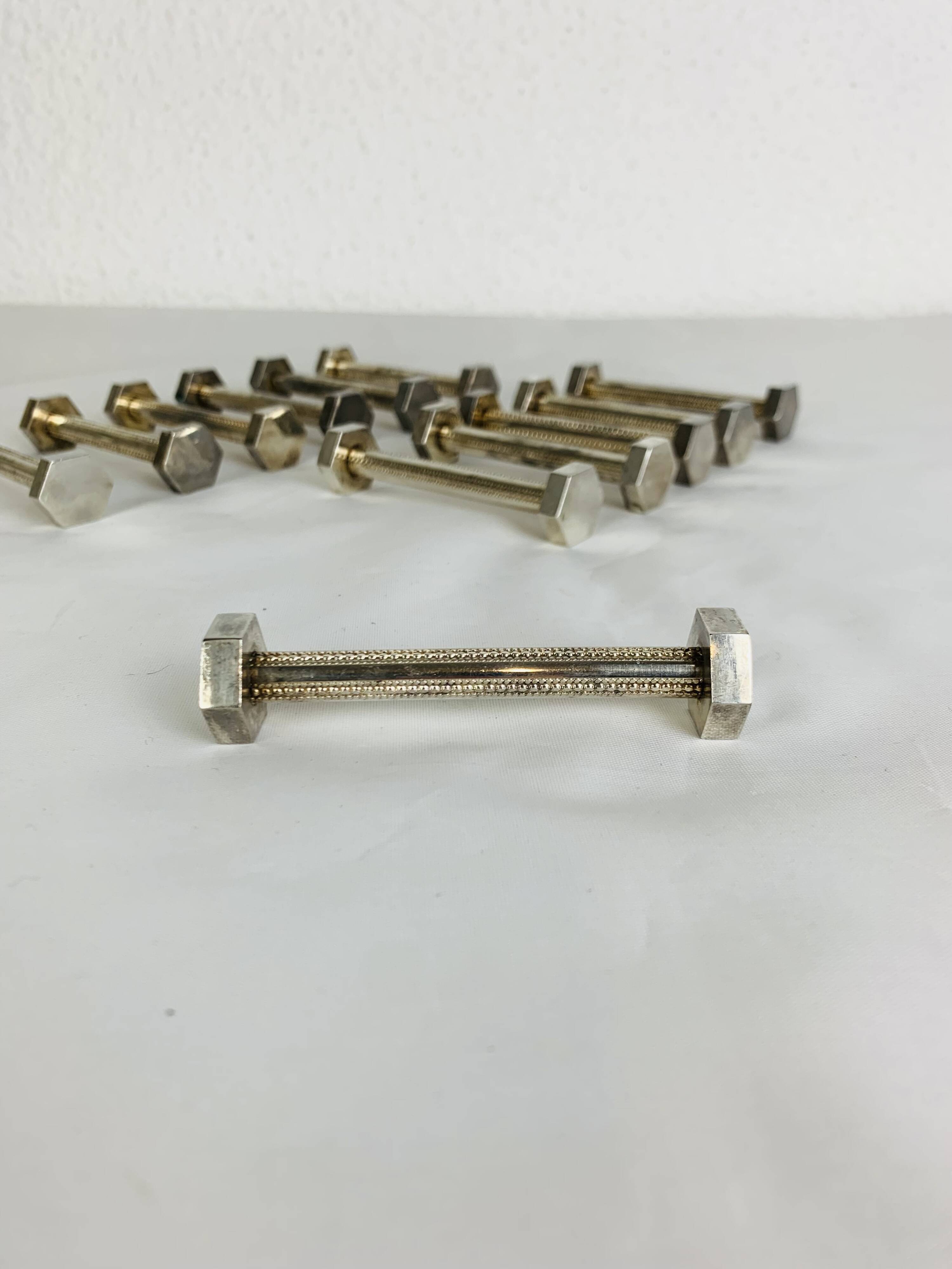 12 art deco silver metal knife holders