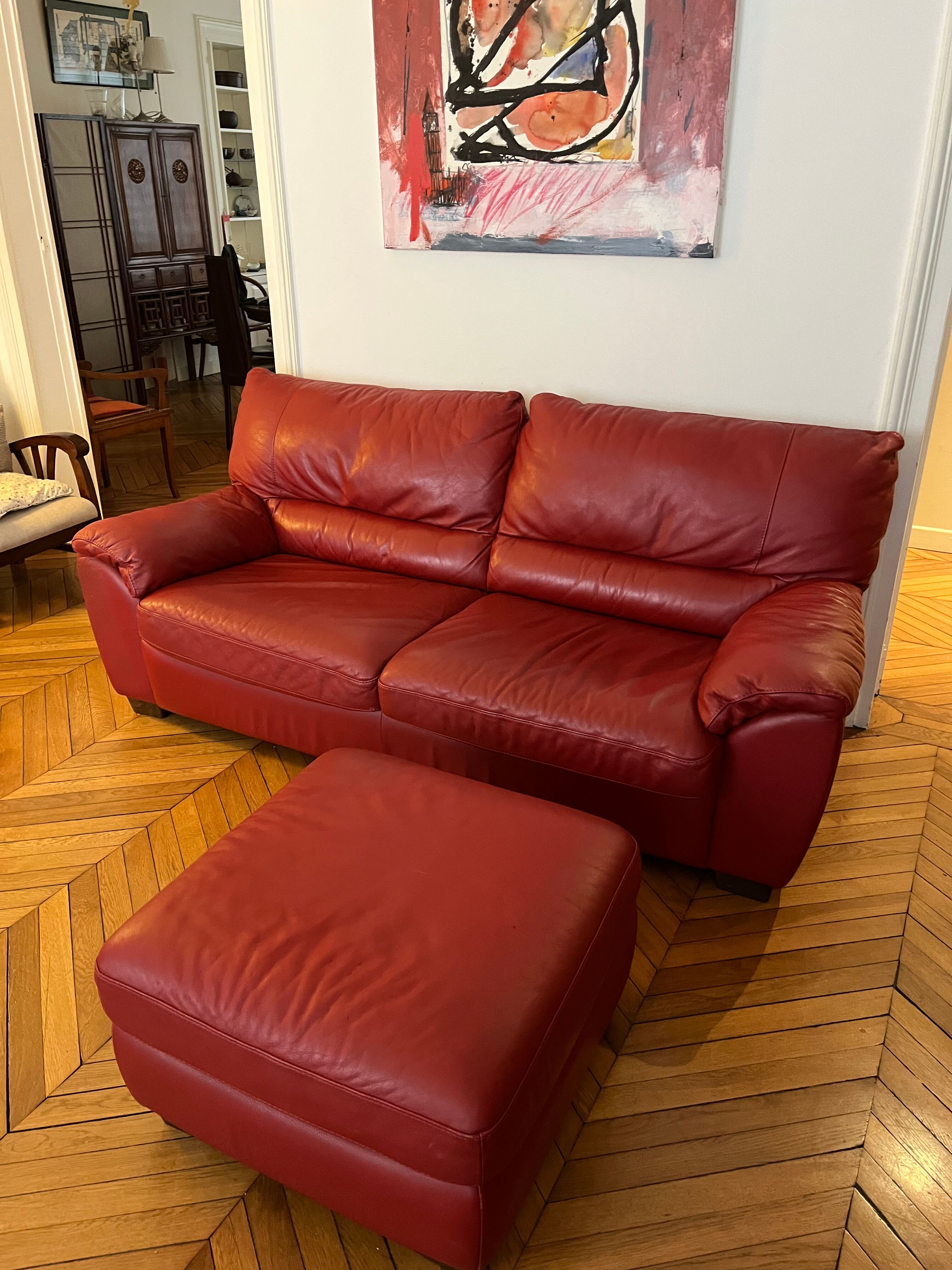 Set convertible leather sofa and footrest Natuzzi