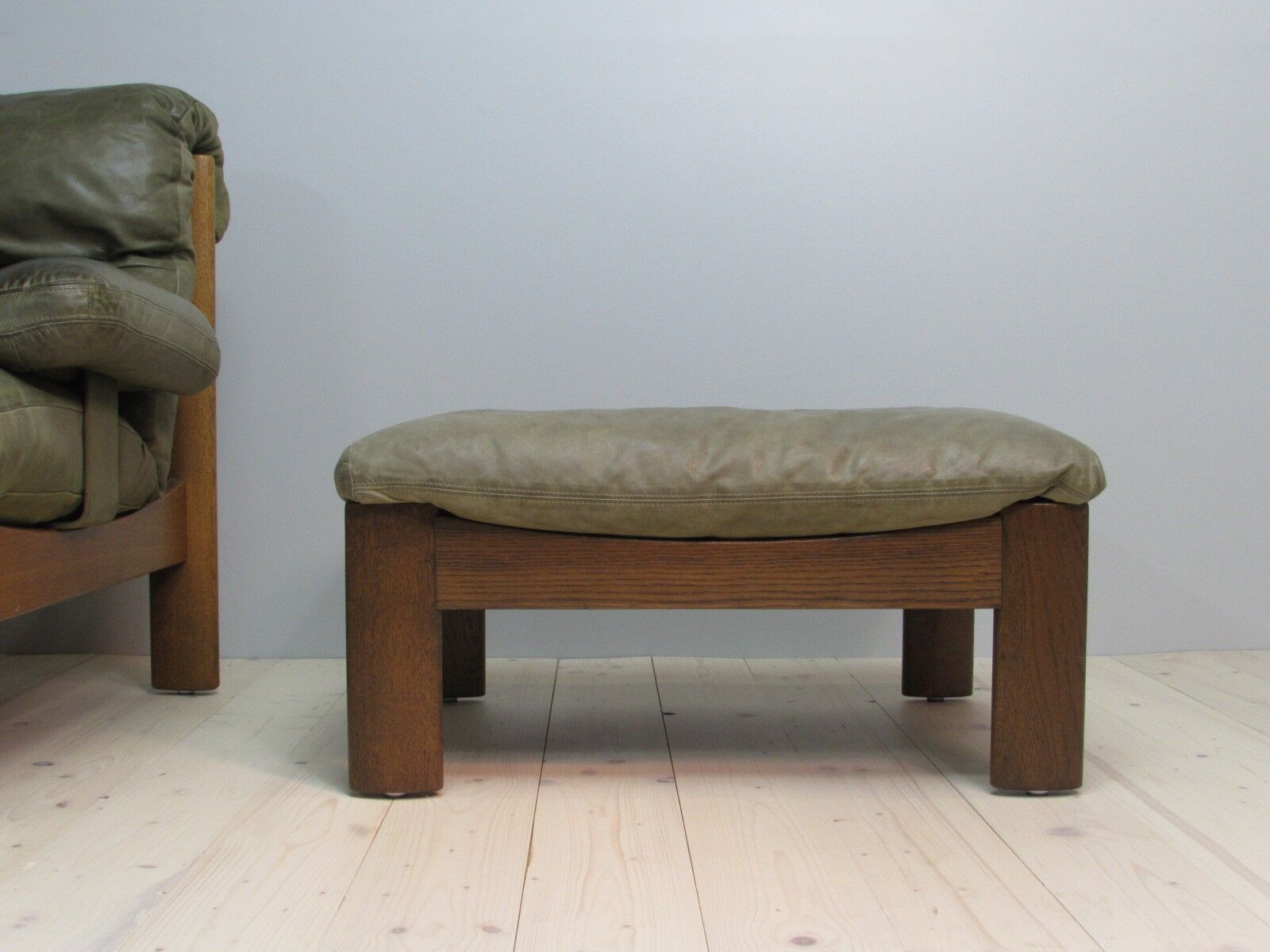 Armchair and footstool - green leather - 1960s