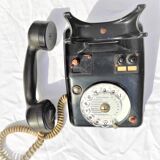 Telephone in black bakelite dial with call system