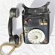 Telephone in black bakelite dial with call system