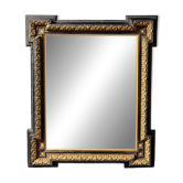 Napoleon III mirror in blackened wood and gilded decoration, second half of the 19th century.