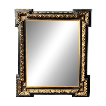 Miroir Napoléon III en bois noirci et décor doré, seconde moitié du XIXe si