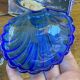Shell-shaped butter dish in stainless steel and blue glass