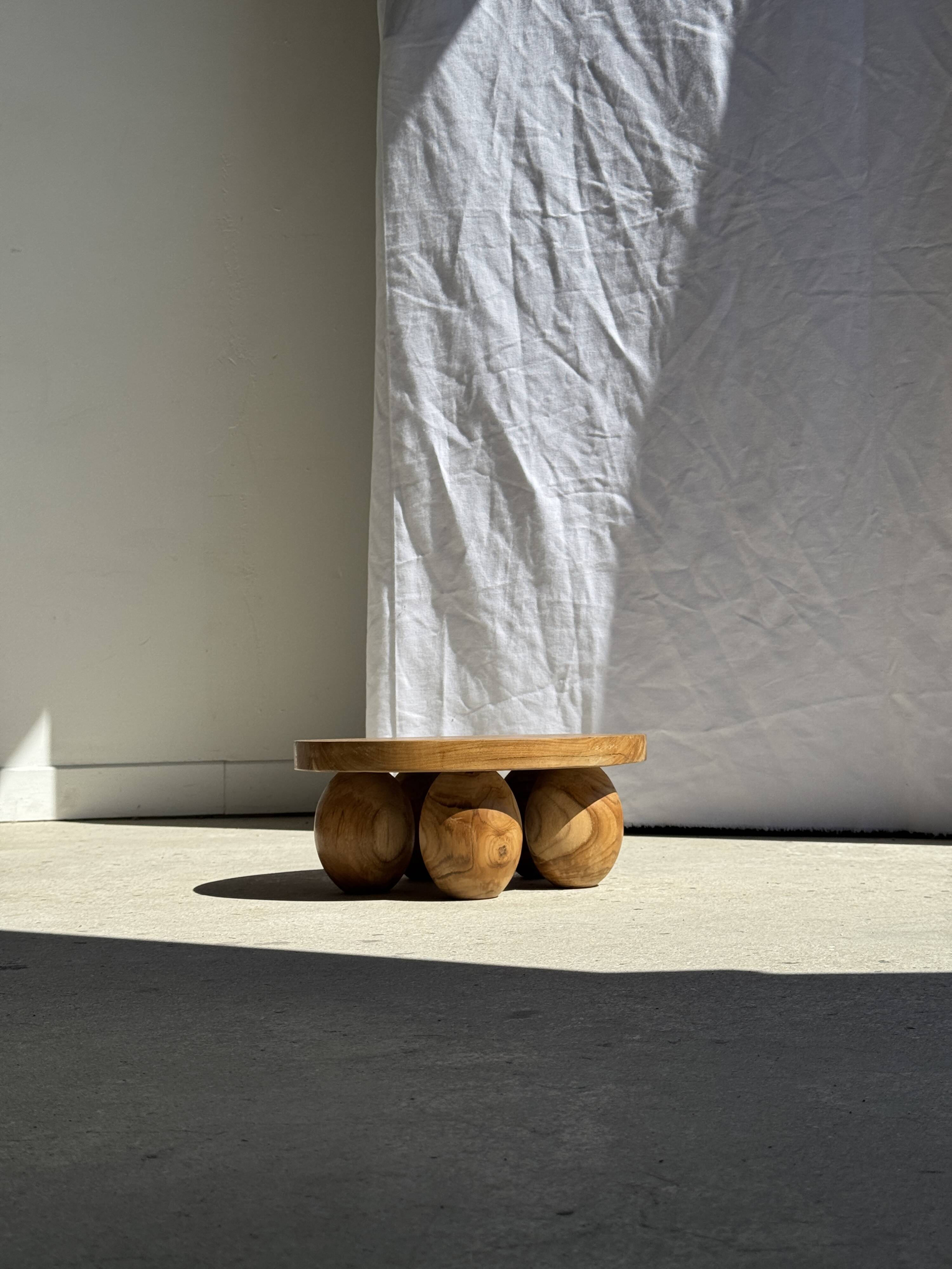 Mini minimalist stool with ball feet in teak H15 D35