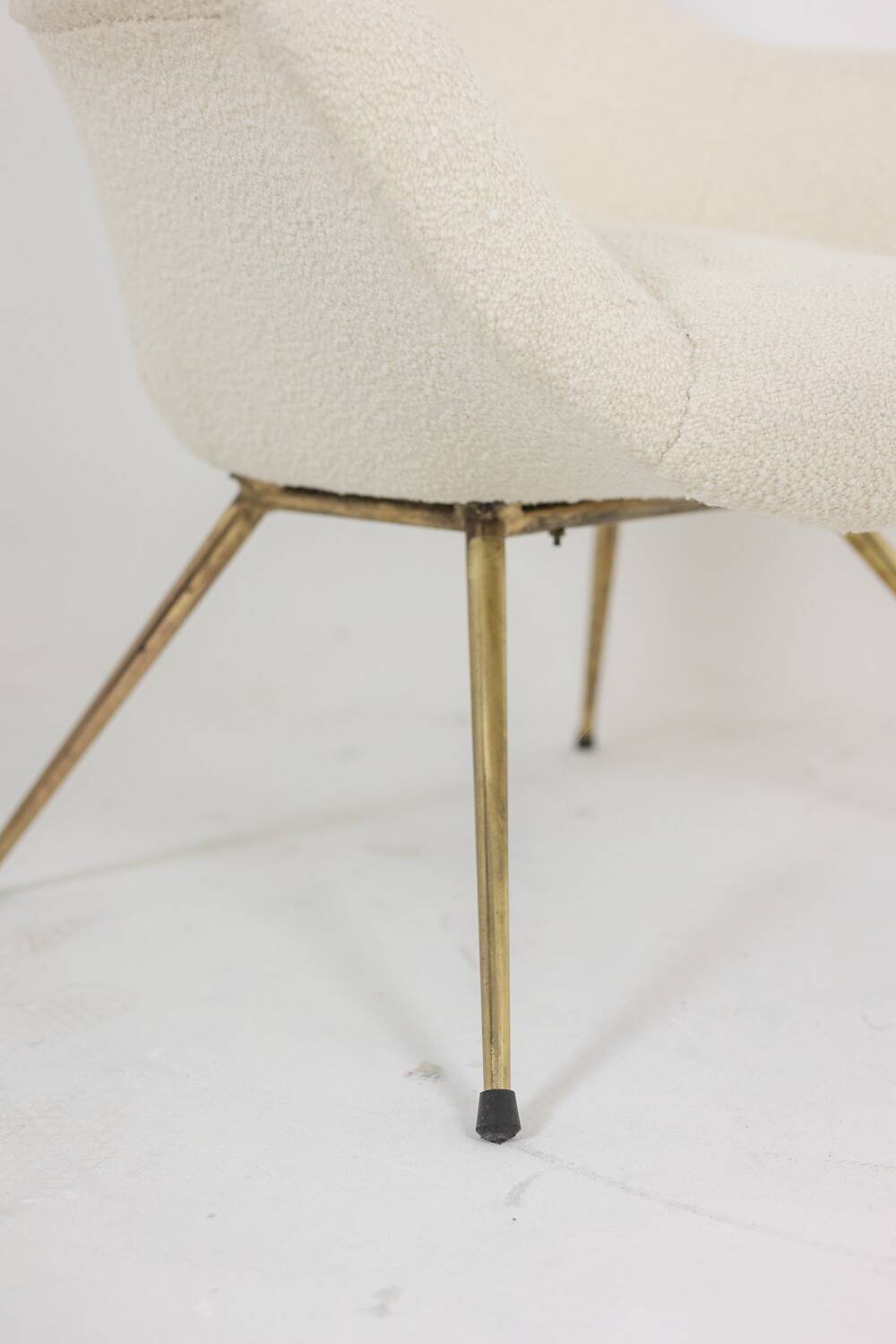Pair of cocktail armchairs in gilded brass. 1960s.