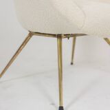 Pair of cocktail armchairs in gilded brass. 1960s.