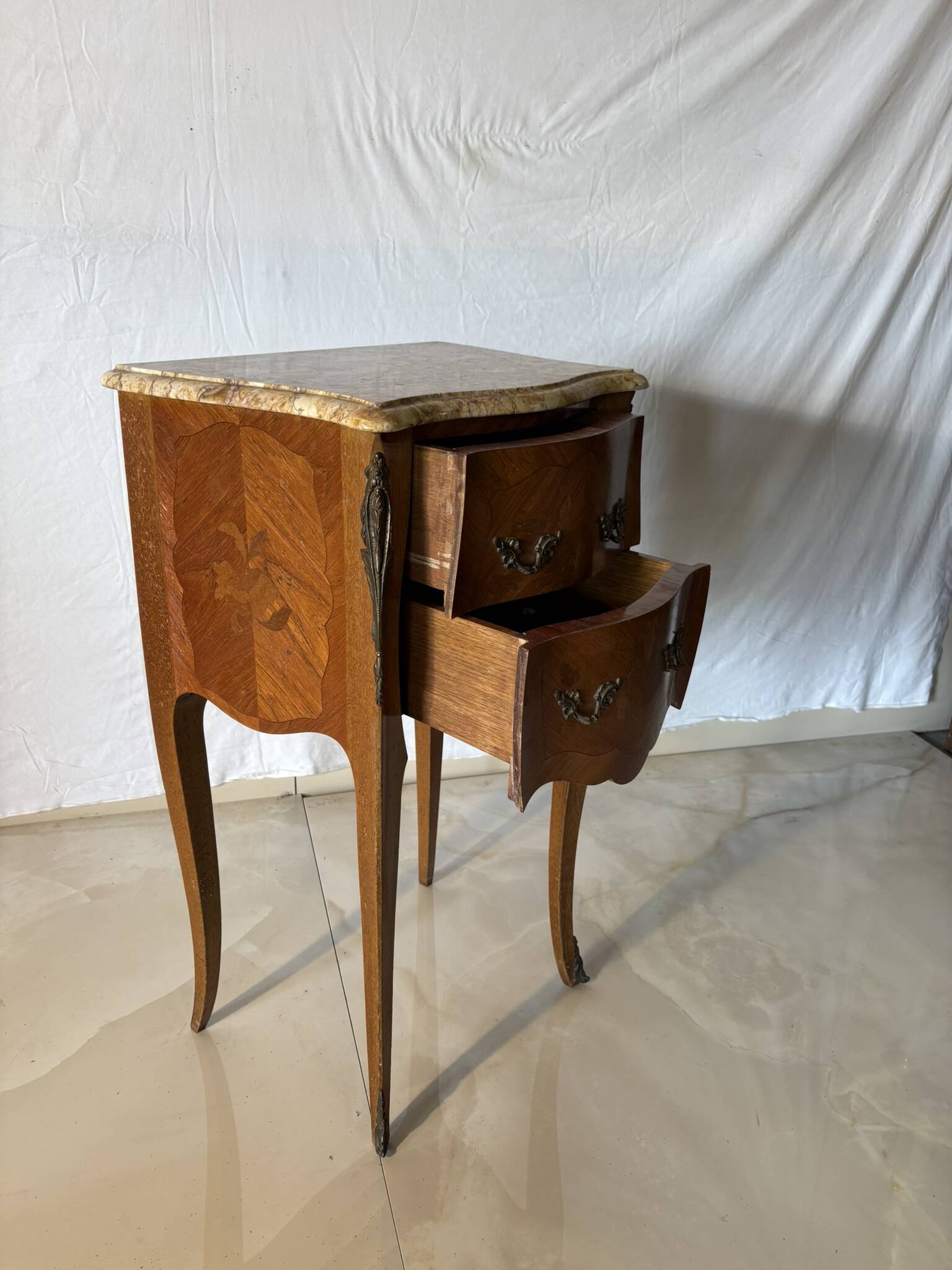 Small curved Louis XV style piece of furniture – marquetry and marble top