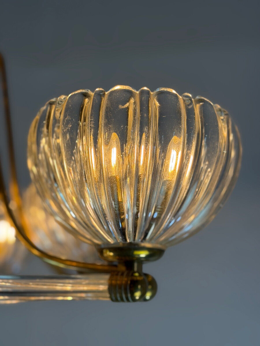 Venetian chandelier in colourless Murano glass and brass, circa 1940.