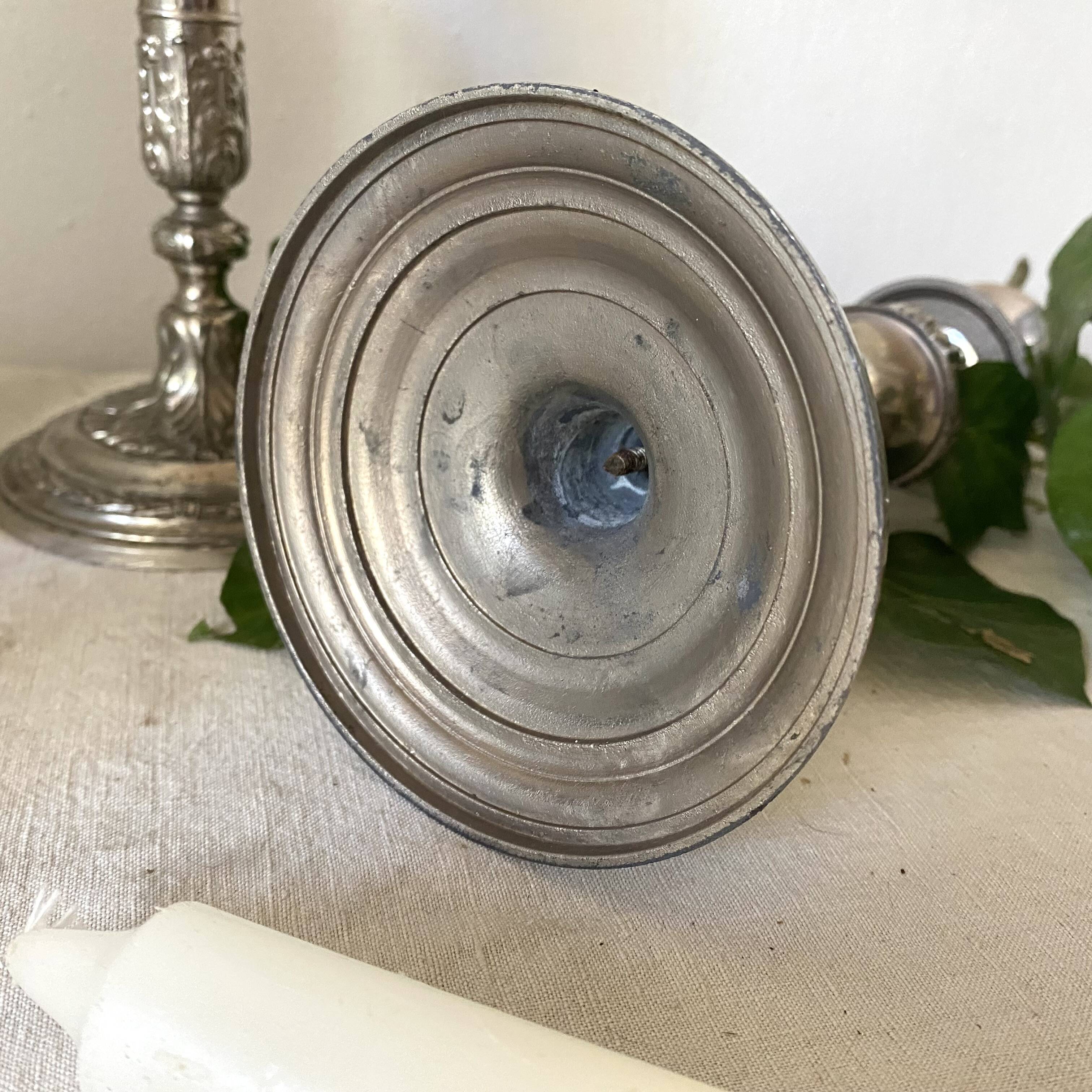 Pair of old silver-plated candlesticks
