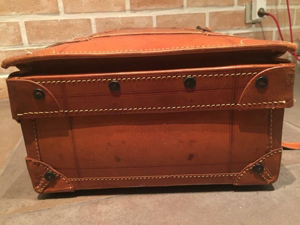 Thick leather suitcase