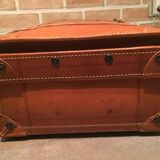 Thick leather suitcase