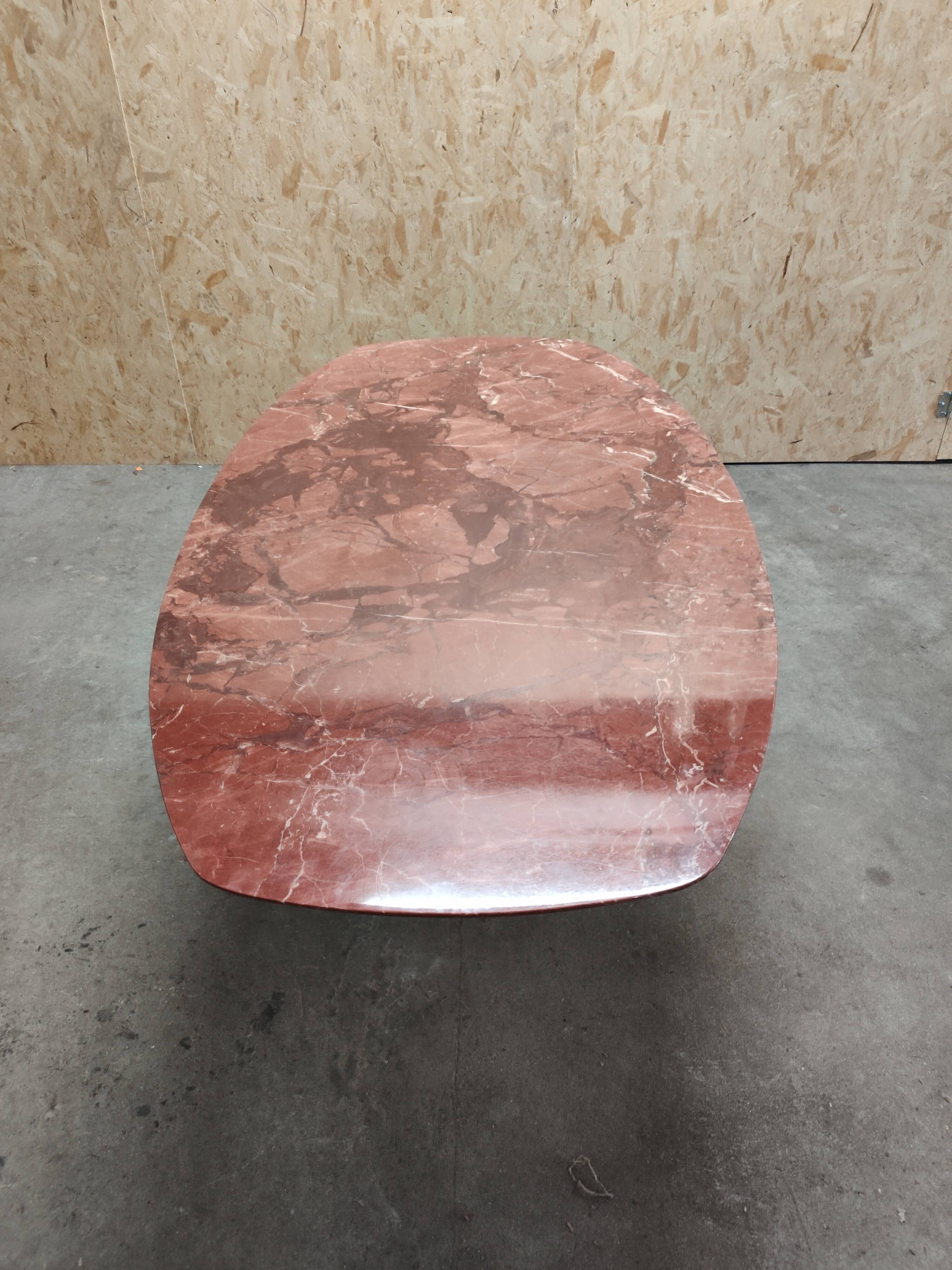 Oval dining table in red marble alicante techno