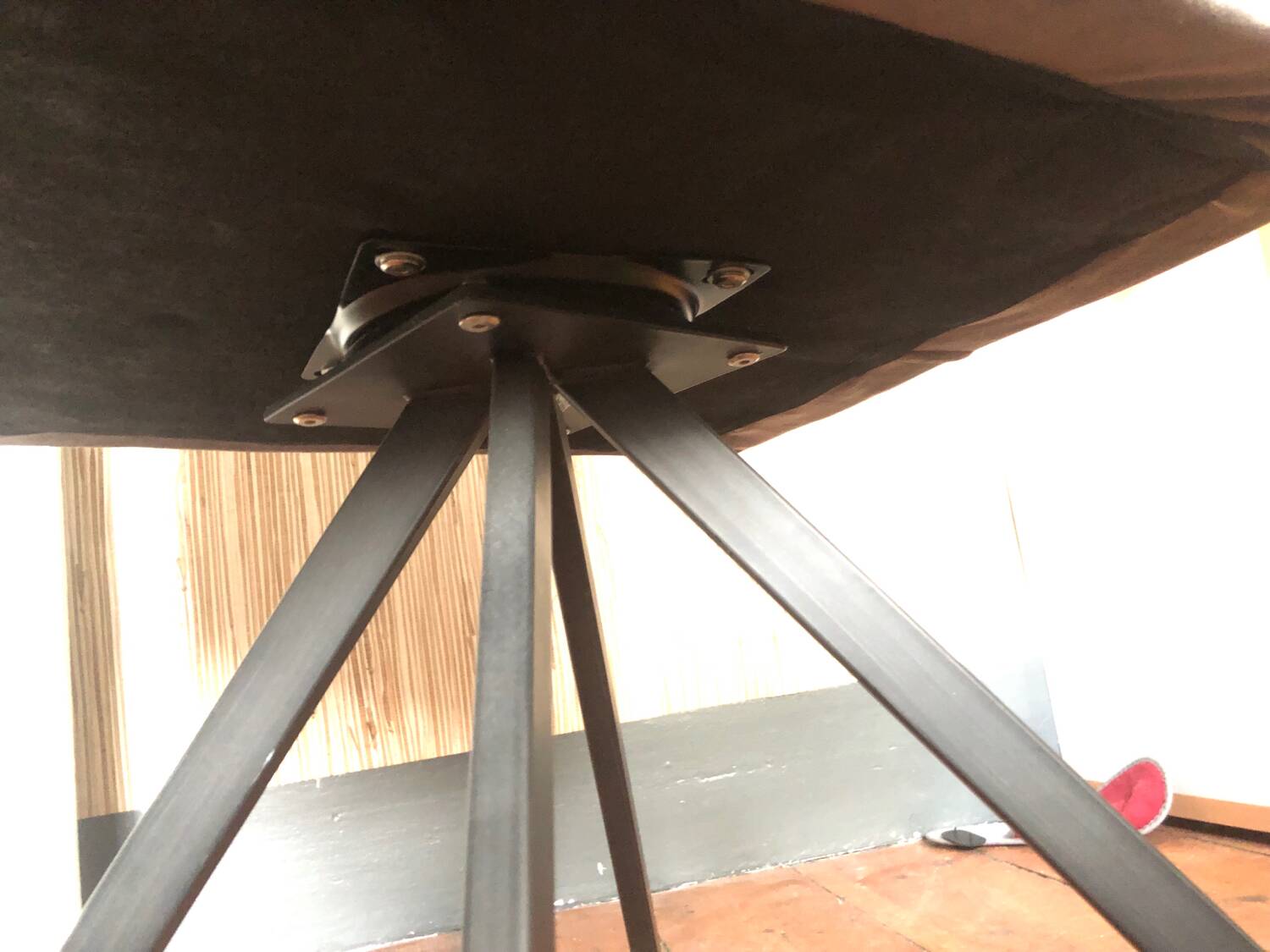 Grey fabric swivel chair in industrial style