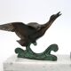 Art Deco lamp decorated with a flying duck, marble base, 1930s.