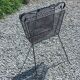 Perforated metal magazine rack from the 1960s.