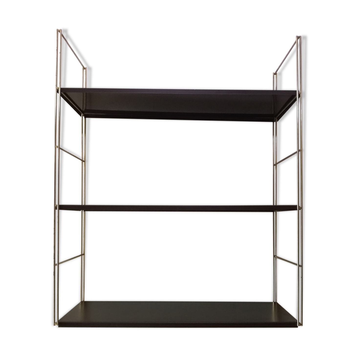 Golden and brown stringed shelf in metal