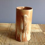 Pitcher in water in sandstone
