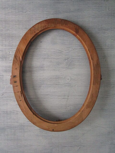 Old oval wooden frame
