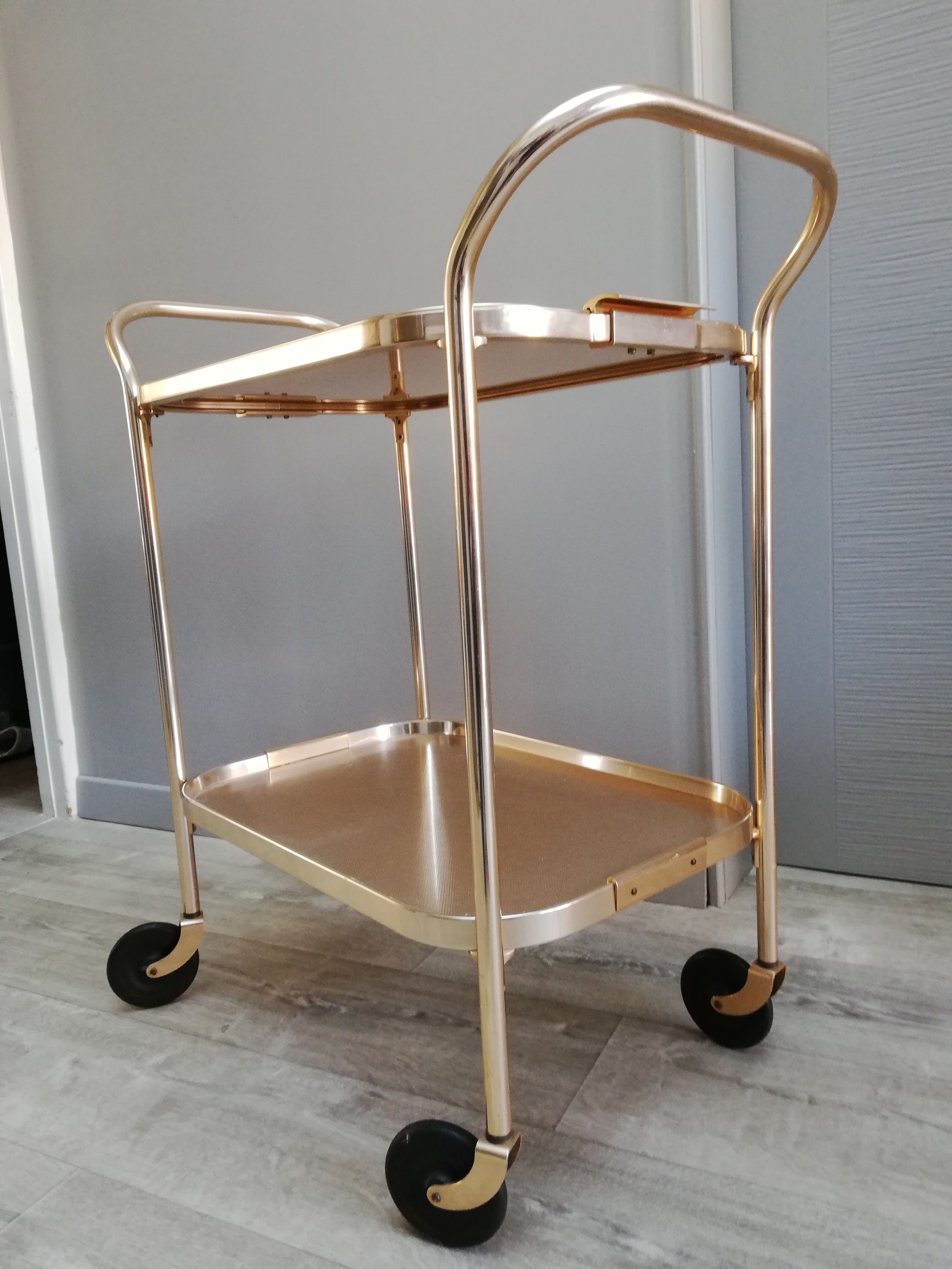 Trolley table with rolling castors gold metal removable tray