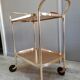 Trolley table with rolling castors gold metal removable tray