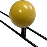 Metal coat rack in the style of Féraud