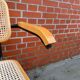 Chaise modèle Cesca conçue par Marcel Breuer avec accoudoirs à structure noire