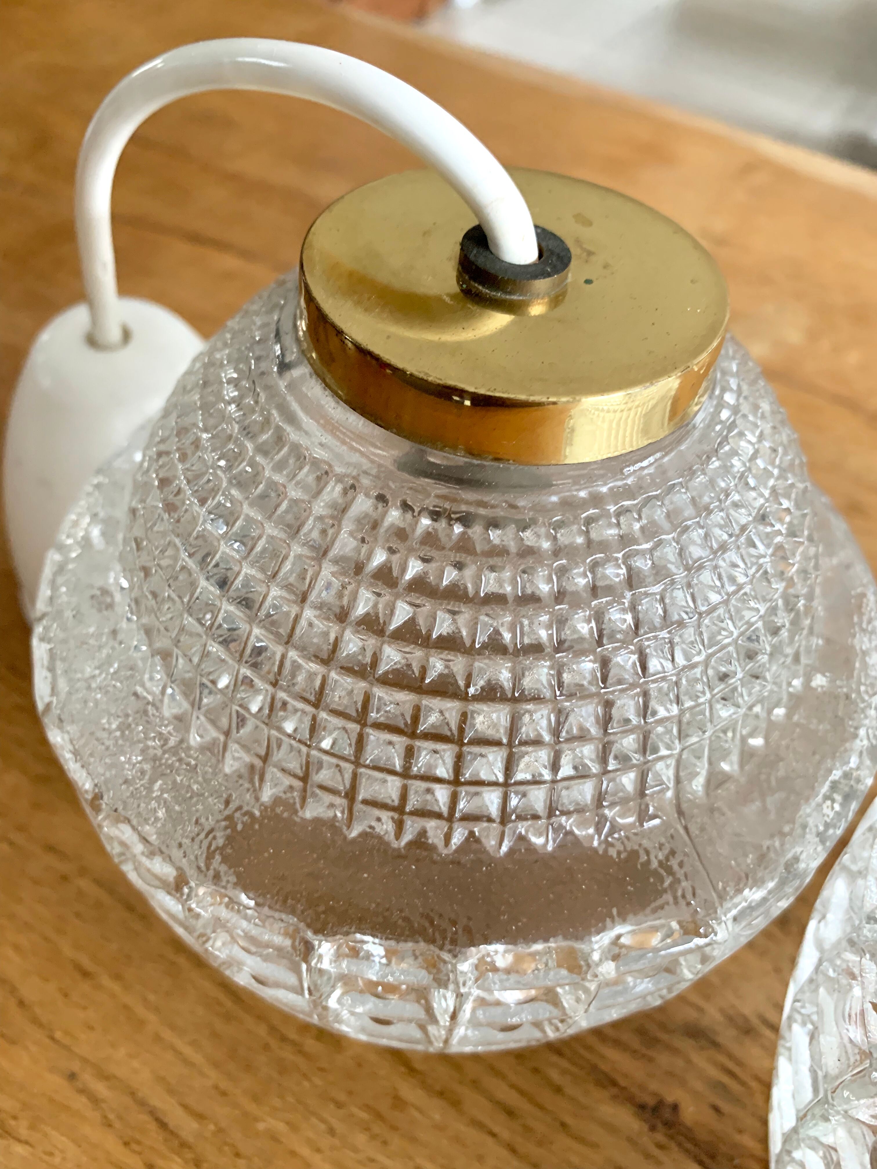 Pair of glass and vintage brass suspension