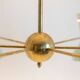 Radiant diablo-shaped chandelier with 12 lights. Contemporary.