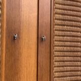 Rattan wardrobe and its compass-legged chest of drawers, 1960