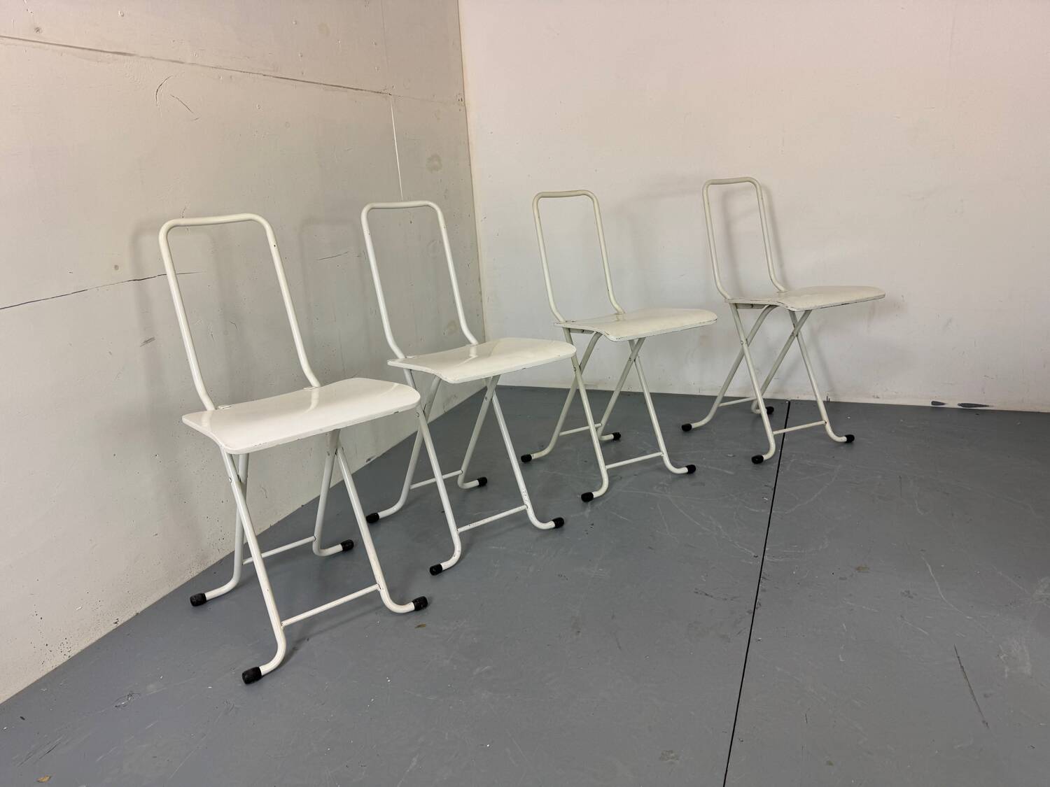 Set of 4 modernist Italian folding chairs,1980s