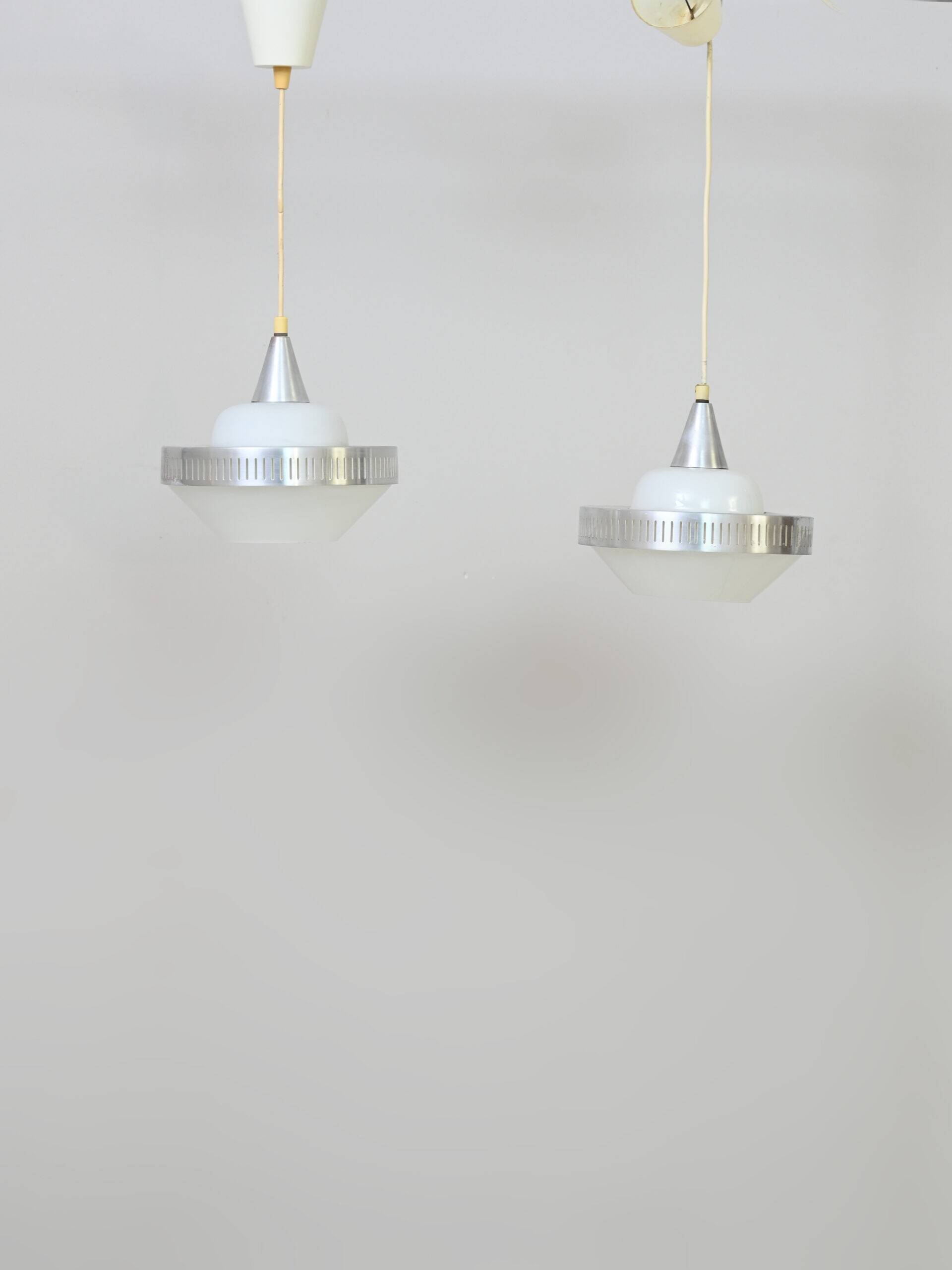 Glass and metal pendant lamps