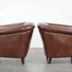 Unique set of two cognac-coloured cow leather club armchairs