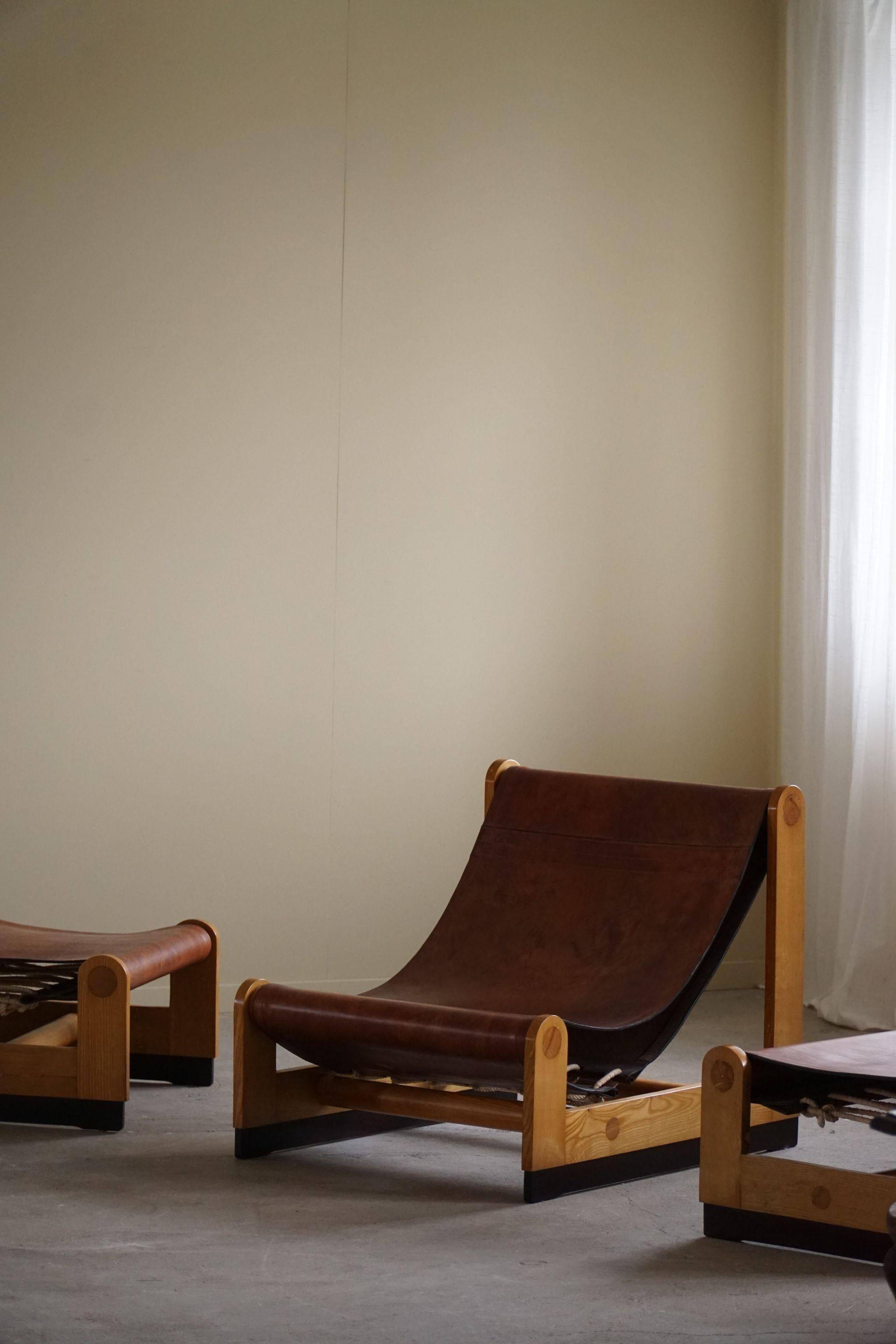 Francesco Lucianetti, Lounge chairs in leather and elm, Italian modern, 1960s