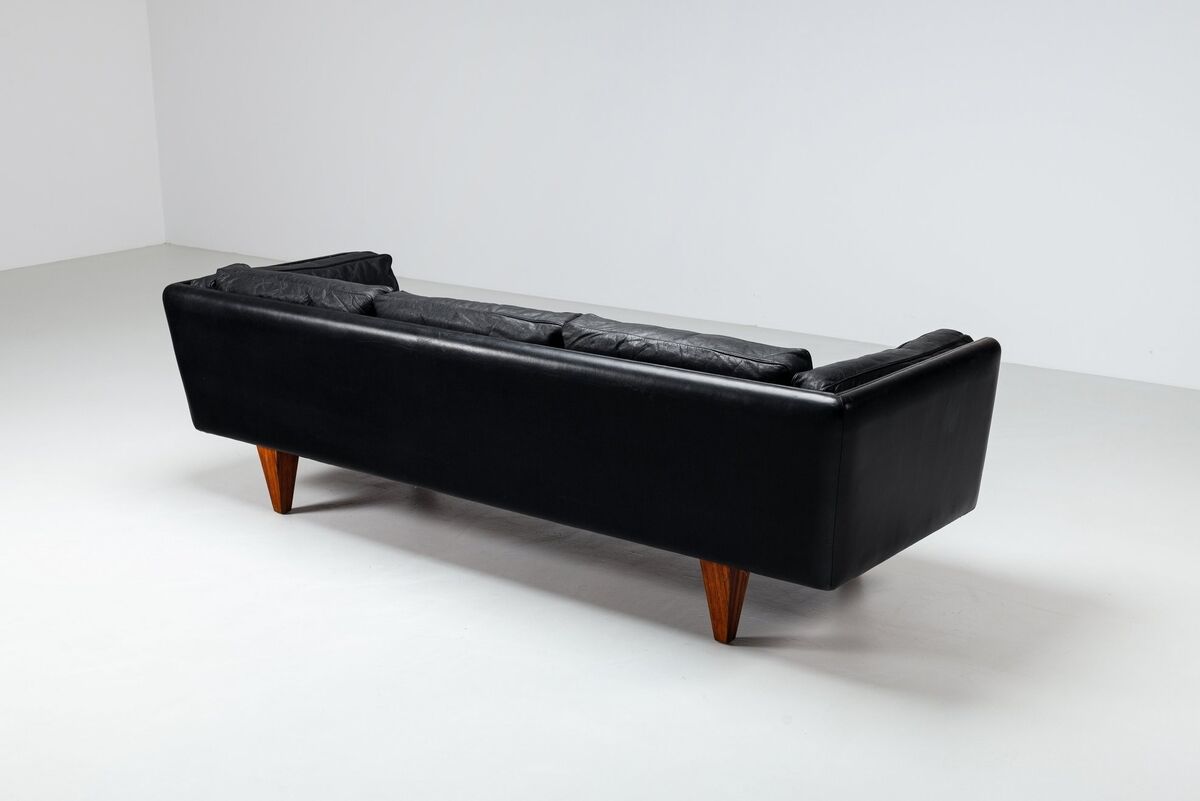 Illum Wikkelso model V11 sofa in black leather by Holger Christiansen, Denmark, 1960