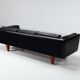 Illum Wikkelso model V11 sofa in black leather by Holger Christiansen, Denmark, 1960