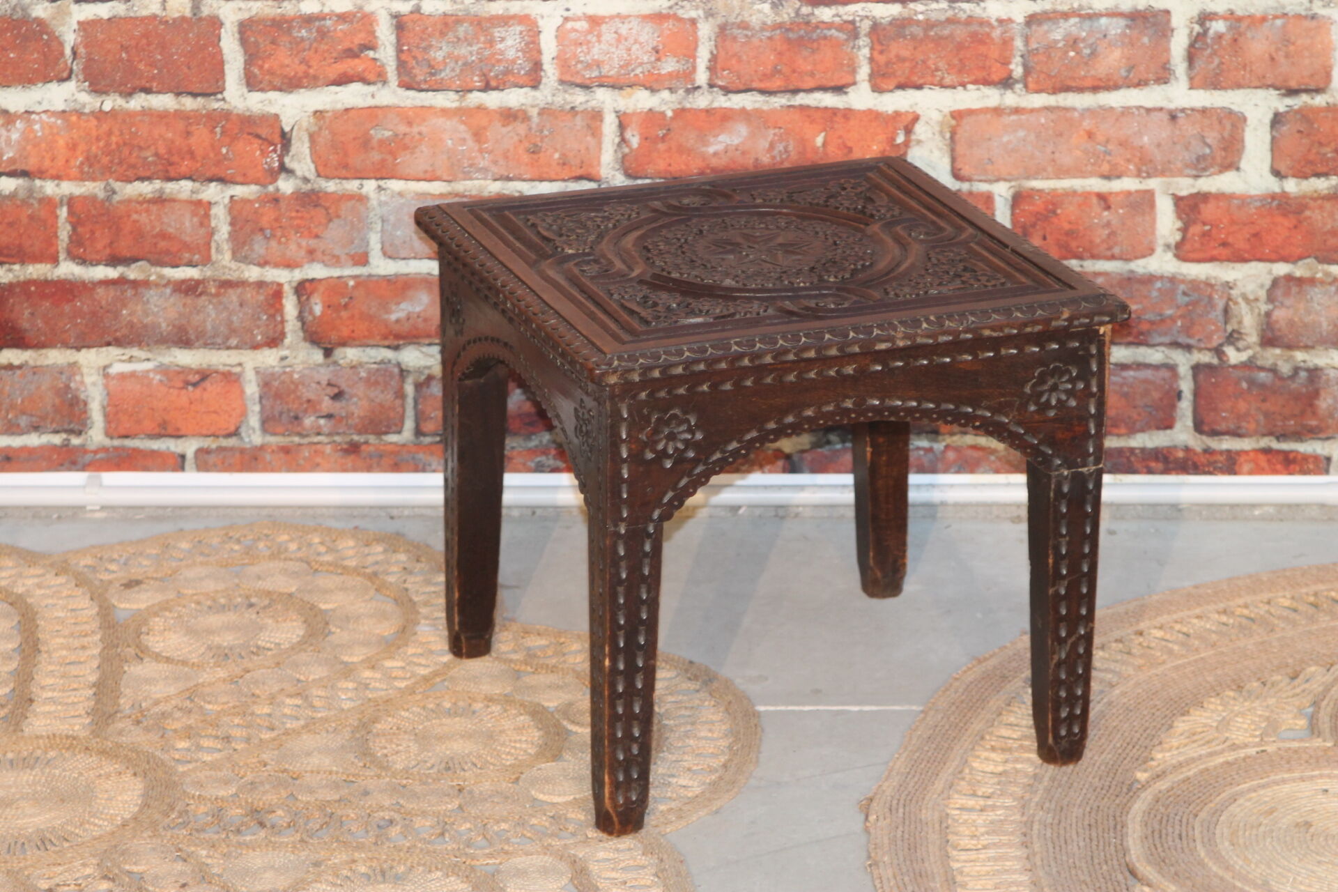 Side table carved top