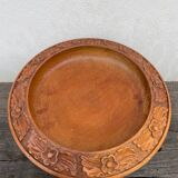 Carved wooden pocket emptier