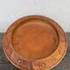 Carved wooden pocket emptier